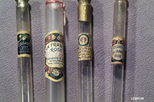 Detail of labels on sample bottles of Colgate perfumes