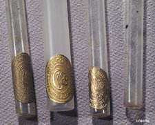Detail of trademark seal on sample vials of Colgate perfume