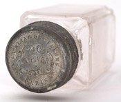Photo of older bottle of 'Trefle Incarnat' seen from bottom