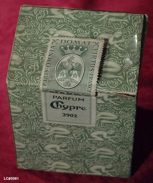 Detail of Outer packaging for Coty's Chypre perfume showing detail of the crest awarded to a Coty ancestor by the Emperor Napoleon Bonaparte