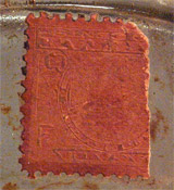 Photo of unknown stamp affixed to bottle of 'Trefle Incarnat' by L.T. Piver